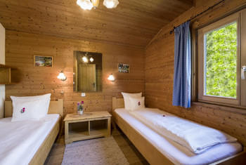 Kinderzimmer mit 2 Einzelbetten im Ferienhaus - Familienurlaub in Tirol